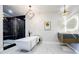 Modern bathroom featuring a standalone tub and separate shower with black marble accents at 1812 Hunters Gln, Marietta, GA 30062