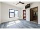 Bedroom with a black framed window and modern fixtures at 1812 Hunters Gln, Marietta, GA 30062