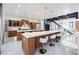 Spacious kitchen with a large island, bar stool seating, and modern stainless steel appliances at 1812 Hunters Gln, Marietta, GA 30062