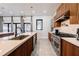Modern kitchen featuring an island with stainless steel appliances and wine storage at 1812 Hunters Gln, Marietta, GA 30062