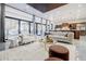 Open concept living room showcasing natural light, modern decor, and a seamless flow to the kitchen at 1812 Hunters Gln, Marietta, GA 30062
