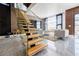 Open-concept living area with floating staircase, stylish decor, and expansive tile flooring at 1812 Hunters Gln, Marietta, GA 30062
