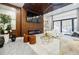 Comfortable living room with a wood ceiling, electric fireplace, and access to a balcony at 1812 Hunters Gln, Marietta, GA 30062