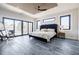 Bright main bedroom with wood slat ceiling, balcony, and large windows at 1812 Hunters Gln, Marietta, GA 30062
