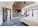 Bedroom featuring a wood slat accent wall, television, and balcony access at 1812 Hunters Gln, Marietta, GA 30062
