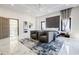 Beautifully staged main bedroom suite featuring elegant marble floors, ambient lighting, and stylish furniture at 1812 Hunters Gln, Marietta, GA 30062