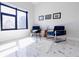 Sitting area with large window, comfortable seating, and a fur rug at 1812 Hunters Gln, Marietta, GA 30062
