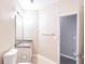 Bathroom with granite countertop, bathtub and neutral tiling at 10 Perimeter Summit Ne Blvd # 3204, Atlanta, GA 30319