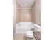 Well-lit bathroom with bathtub and shower, vanity with granite countertop, and tiled walls at 10 Perimeter Summit Ne Blvd # 3204, Atlanta, GA 30319