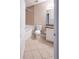 Bathroom features tiled floor, tile surround bathtub and updated vanity at 10 Perimeter Summit Ne Blvd # 3204, Atlanta, GA 30319