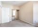 Neutral bedroom features carpeted flooring and mirrored closet at 10 Perimeter Summit Ne Blvd # 3204, Atlanta, GA 30319