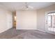Bedroom with ceiling fan, an access door to a balcony, and neutral paint at 10 Perimeter Summit Ne Blvd # 3204, Atlanta, GA 30319
