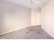 Neutral bedroom features carpeted flooring and double door closet at 10 Perimeter Summit Ne Blvd # 3204, Atlanta, GA 30319