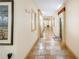 Inviting hallway features neutral walls and beautiful tile floors at 10 Perimeter Summit Ne Blvd # 3204, Atlanta, GA 30319