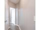 Clean hallway with neutral paint and wood flooring provides access to rooms at 10 Perimeter Summit Ne Blvd # 3204, Atlanta, GA 30319