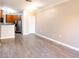 Open living area featuring a large window with natural light and hardwood floors at 10 Perimeter Summit Ne Blvd # 3204, Atlanta, GA 30319
