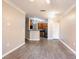 Bright living space with hardwood floors flows into the modern kitchen at 10 Perimeter Summit Ne Blvd # 3204, Atlanta, GA 30319