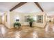 Lobby featuring plants, seating area and beautiful tile floors at 10 Perimeter Summit Ne Blvd # 3204, Atlanta, GA 30319