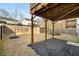 Backyard with a wood privacy fence, mulch landscaping, and a two story deck at 1872 Commons Nw Pl, Atlanta, GA 30318