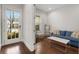 Cozy living room featuring a large window for natural light and comfortable seating, great for relaxation at 1872 Commons Nw Pl, Atlanta, GA 30318
