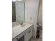 Bathroom with a large mirror, white vanity, and a view of the toilet at 2201 Pine Heights Ne Dr, Atlanta, GA 30324