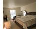 Bedroom featuring carpet floors, neutral paint and lots of natural light at 2201 Pine Heights Ne Dr, Atlanta, GA 30324