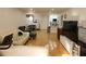 Open-concept living area with hardwood floors, a comfortable sofa, and natural light at 2201 Pine Heights Ne Dr, Atlanta, GA 30324