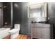 Stylish bathroom with black walls, gold fixtures, and modern vanity at 2626 Peachtree Nw Rd # 1102, Atlanta, GA 30305