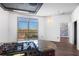 Modern kitchen with stainless steel appliances and a view to a large open area with a brick wall at 2626 Peachtree Nw Rd # 1102, Atlanta, GA 30305