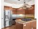 Close-up of kitchen features stainless steel appliances, granite countertops, and modern cabinets at 2626 Peachtree Nw Rd # 1102, Atlanta, GA 30305