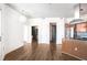 Open-concept kitchen with stainless steel appliances and view of a large open living space at 2626 Peachtree Nw Rd # 1102, Atlanta, GA 30305