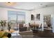 Bright living room open to a bedroom and has a view at 2626 Peachtree Nw Rd # 1102, Atlanta, GA 30305