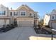Charming two-story townhouse featuring a two-car garage and well-maintained landscaping at 5512 Cascade Sw Run, Atlanta, GA 30336