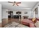 Spacious open living area featuring a kitchen island, pool table, and comfortable seating at 5512 Cascade Sw Run, Atlanta, GA 30336