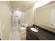 Bathroom with a frameless shower and dark vanity at 951 Plaza Park Walk # 50, Kennesaw, GA 30144