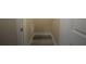 Walk-in closet space featuring hardwood flooring and door for storage at 951 Plaza Park Walk # 50, Kennesaw, GA 30144