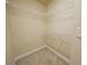 Walk-in closet includes carpet and metal rack shelving at 951 Plaza Park Walk # 50, Kennesaw, GA 30144