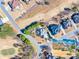 A birds eye view of a home nestled within a community and next to the neighborhood golf course at 955 Golf View Ct, Dacula, GA 30019