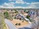 Expansive aerial view of a neighborhood showcasing lush trees and well-manicured lawns at 955 Golf View Ct, Dacula, GA 30019