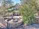 Inviting backyard featuring a cozy fire pit area perfect for outdoor relaxation and entertaining at 955 Golf View Ct, Dacula, GA 30019