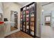 Custom closet with glass door cabinets at 955 Golf View Ct, Dacula, GA 30019