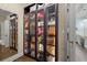Large closet with custom glass door cabinets at 955 Golf View Ct, Dacula, GA 30019