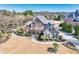 Elegant home featuring a beautiful entrance, manicured lawn, and professionally landscaped grounds at 955 Golf View Ct, Dacula, GA 30019