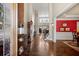 Grand foyer with soaring ceilings, hardwood floors, and elegant decor leading to the living spaces at 955 Golf View Ct, Dacula, GA 30019
