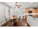 Bright kitchen nook with a round table, four chairs, and a ceiling fan at 955 Golf View Ct, Dacula, GA 30019