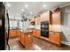 Kitchen with a center island, stainless steel appliances, and ample cabinet space at 955 Golf View Ct, Dacula, GA 30019