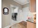 Laundry room with washer and dryer units visible through an open doorway at 955 Golf View Ct, Dacula, GA 30019
