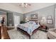 Beautiful main bedroom with hardwood floors, sitting area, and ensuite bathroom at 955 Golf View Ct, Dacula, GA 30019