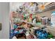Walk-in pantry featuring wire shelving, well-stocked with various food items and household goods at 955 Golf View Ct, Dacula, GA 30019
