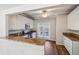 Modern kitchen featuring granite countertops and stainless steel appliances at 2075 Pine Tree Dr # D4, Buford, GA 30518